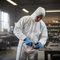 High-Performance Disposable Coveralls with Full-Body Protection, Breathable Non-Woven Fabric, and Secure Fit for Industrial Use
