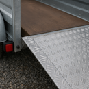 Aluminium chequer plate ramp on trailer.