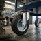 200mm Pressed Steel Swivel Castor Wheel - Black Rubber & 4-Hole Plate - 180kg Load Capacity