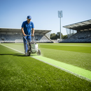 Green GrassMark Premium Grass Line Marking Paint in use on sports pitch | IndtriLine