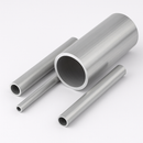 Hollow aluminum pipes of different diameters arranged on white background