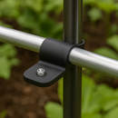 Horizontal support bar clamped to vertical post using black metal bracket and bolt in a garden structure.