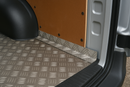 Aluminium chequer plate flooring in van interior.