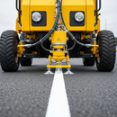Close-up 4-wheel line marker spraying line on tarmac | IndtriLine