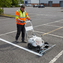 Professional battery-powered line marking machine on car park | IndtriLine