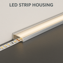 LED strip housed in an aluminum channel for sleek wall lighting installation.