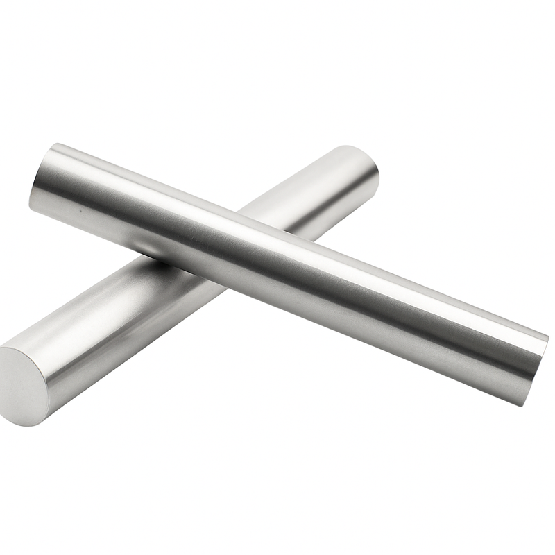 Polished stainless steel round bars crossed on white background