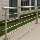 Modern stainless steel railing with horizontal bars installed on outdoor walkway